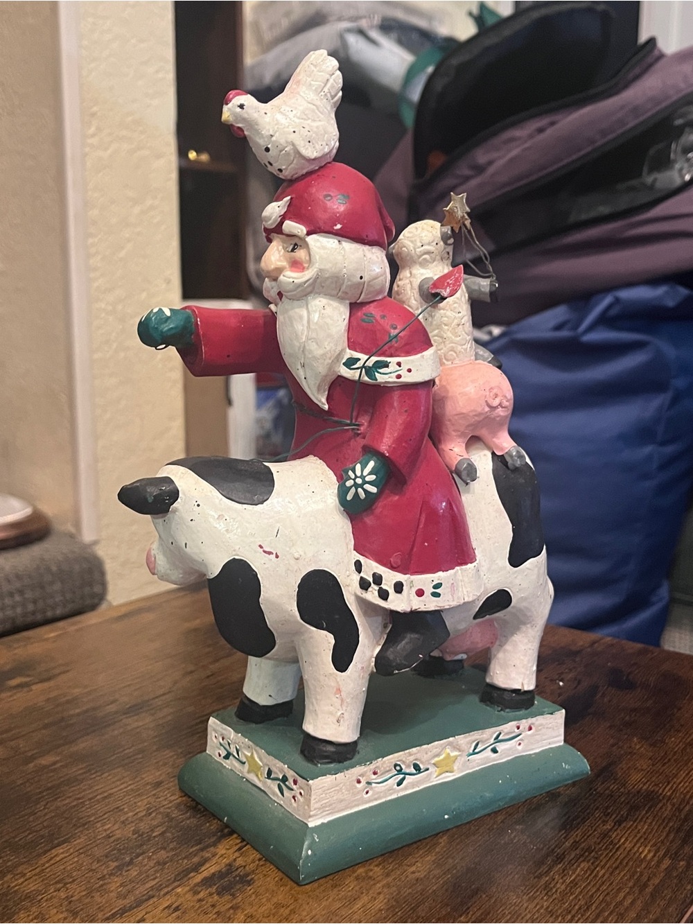 Festive Red Santa Riding Cow Holiday Figurine 089